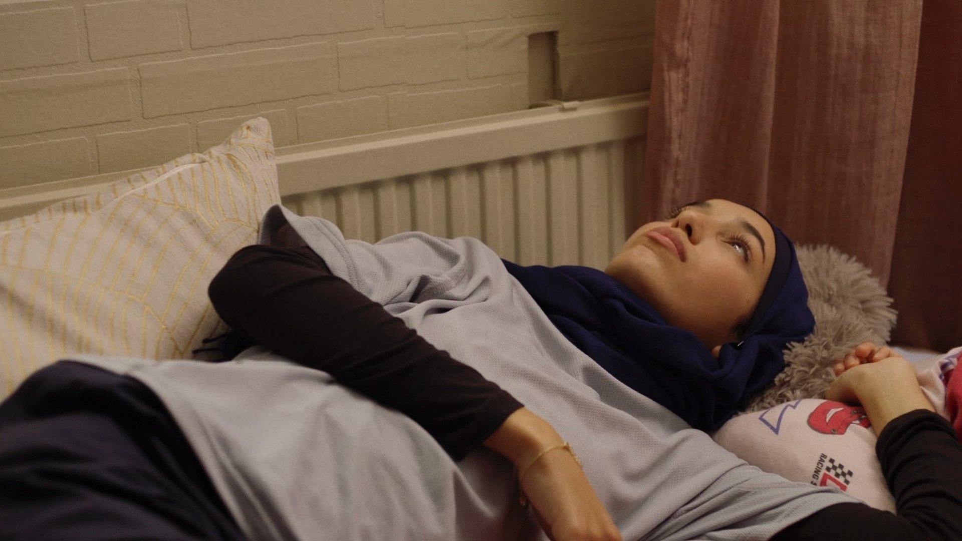 fille allongé dans son lit