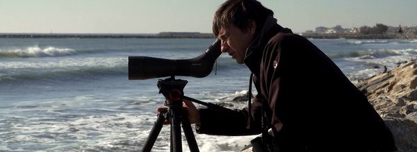 Homme avec monoculaire sur la cote - Cocheurs