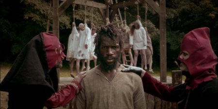 bourreaux et homme noir devant gibet cover